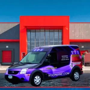 Yeagle Technologies field support van parked outside a manufacturing facility